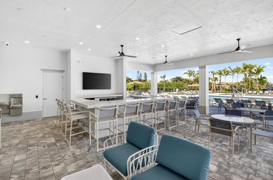 RENOVATED, MOVE-IN READY VILLA. Experience effortless Florida - photo 25