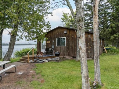 This charming four-unit resort on Lake Emily boasts 2,276 square - photo 26