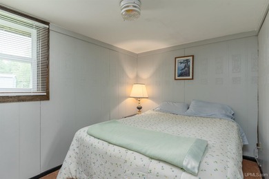 This charming four-unit resort on Lake Emily boasts 2,276 square - photo 35