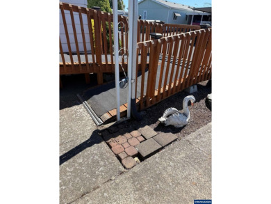 55+ Community. Well maintained, spacious home. Lots of storage