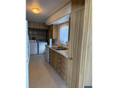 55+ Community. Well maintained, spacious home. Lots of storage