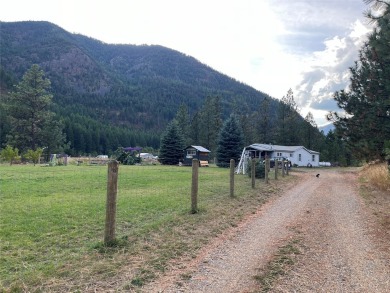 Lake Home For Sale in Alberton, Montana