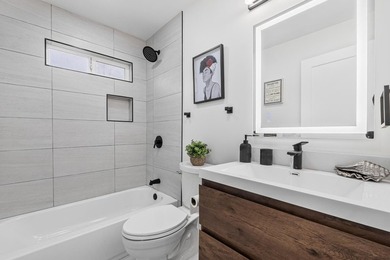 Welcome to this charming 4-bedroom, 2-bathroom home located in - photo 18