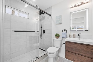 Welcome to this charming 4-bedroom, 2-bathroom home located in - photo 22