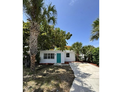 Single family home located just a few miles from the beach! New - photo 1