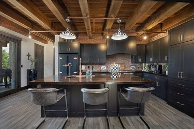 Architecturally striking golf course residence located on the - photo 11
