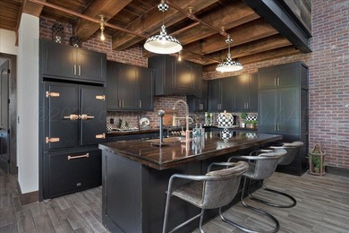 Architecturally striking golf course residence located on the - photo 12