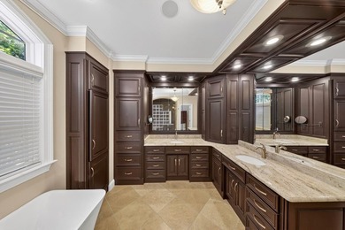 Extraordinary custom-built home nestled in the prestigious gated - photo 19