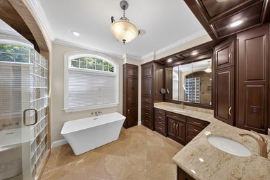 Extraordinary custom-built home nestled in the prestigious gated - photo 20