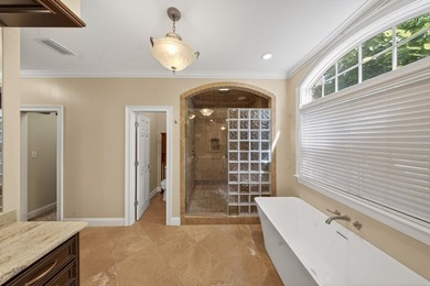 Extraordinary custom-built home nestled in the prestigious gated - photo 21