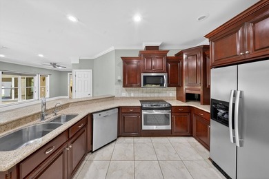 Extraordinary custom-built home nestled in the prestigious gated - photo 24
