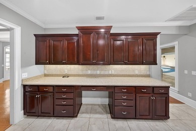 Extraordinary custom-built home nestled in the prestigious gated - photo 26