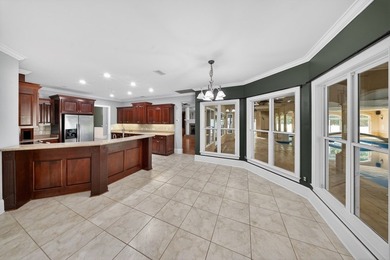 Extraordinary custom-built home nestled in the prestigious gated - photo 27