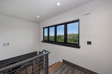 Architecturally striking golf course residence located on the - photo 29