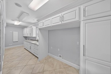 Extraordinary custom-built home nestled in the prestigious gated - photo 39