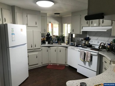 Well maintained home awaits you! Spacious kitchen w/ ample