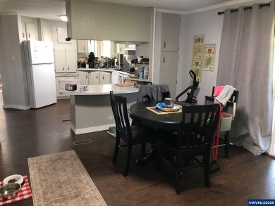 Well maintained home awaits you! Spacious kitchen w/ ample