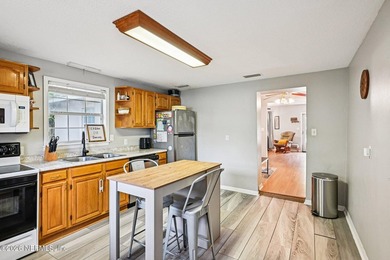 Welcome home to this Lakewood charmer, where comfort and - photo 11