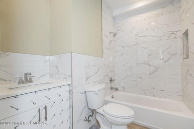 NEW CONSTRUCTION 6-OVER-6 Located in the desirable section of - photo 20