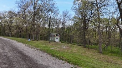 This heavily wooded property offers a private, peaceful setting - photo 3