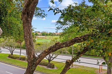 Welcome to this charming two-bedroom, one-bathroom condominium - photo 12