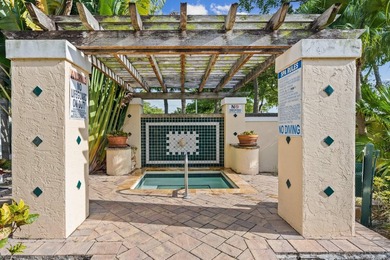 Welcome to this charming two-bedroom, one-bathroom condominium - photo 14