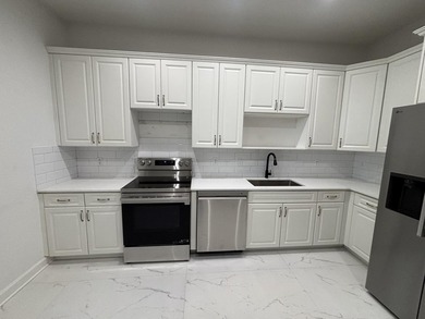 Mostly renovated, upgraded floors, kitchen countertops and all - photo 14