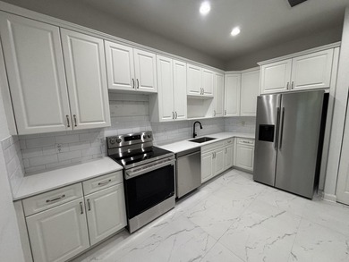 Mostly renovated, upgraded floors, kitchen countertops and all - photo 15