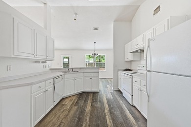 Welcome home to this beautifully maintained brick residence - photo 17