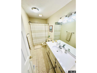 This gem of a home located in the Village at Nags Head is a - photo 20