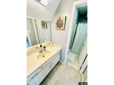 This gem of a home located in the Village at Nags Head is a - photo 26