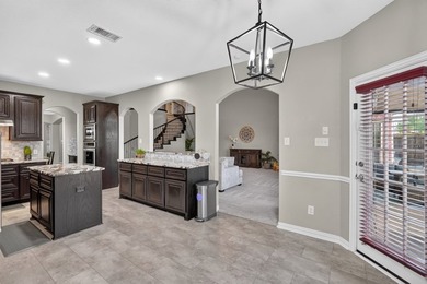 Welcome to this meticulously maintained 6-bedroom home on a - photo 12