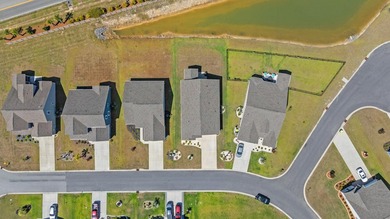 Only 4 miles from the beach, this stunning 2023-built home - photo 33