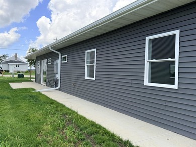 Enjoy comfortable, modern living directly across from beautiful - photo 8