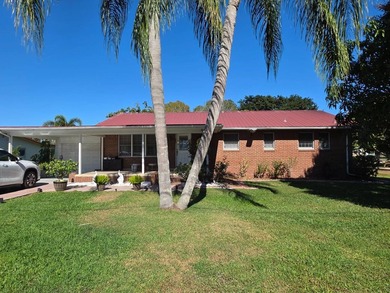 LAKE OKEECHOBEE ACCESS - Exceptional brick home situated on a - photo 2