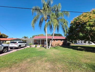 LAKE OKEECHOBEE ACCESS - Exceptional brick home situated on a - photo 3