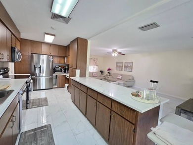 LAKE OKEECHOBEE ACCESS - Exceptional brick home situated on a - photo 9