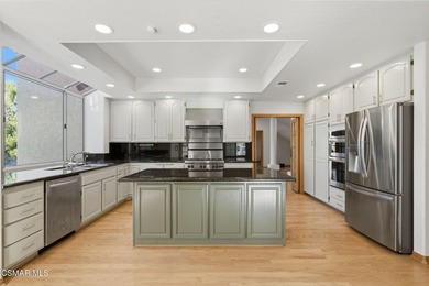 This beautifully maintained 4-bedroom, 4-bathroom residence - photo 17