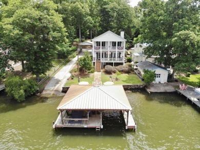 Vast views with covered dock on Jackson Lake!  - Lake Home For Sale in Mansfield, Georgia