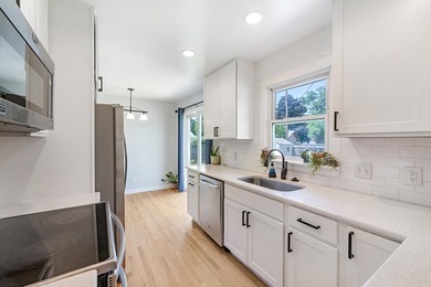 Step into this beautifully refreshed 3-bedroom, 1.5-bath ranch - photo 8