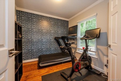 Welcome to this sunlit all brick center hall colonial located in - photo 14