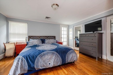 Welcome to this sunlit all brick center hall colonial located in - photo 15