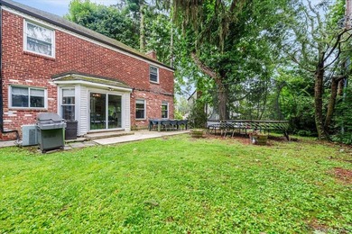 Welcome to this sunlit all brick center hall colonial located in - photo 26