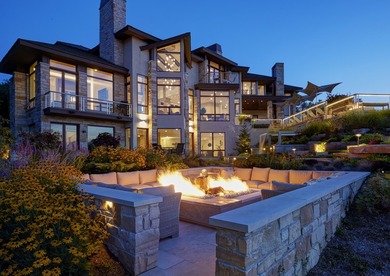 Gated Entry...Winding road in...Mature Landscaping hugging the - photo 2