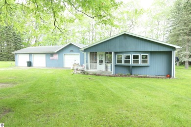 Lake Home For Sale in Weidman, Michigan