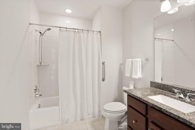 Welcome to this beautifully refreshed top-floor condo in the - photo 33
