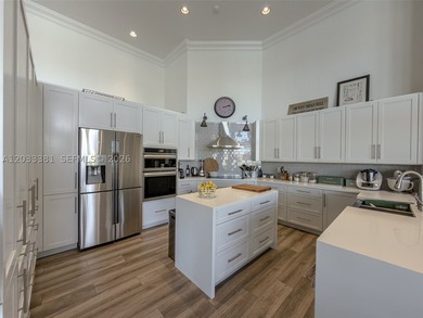 Experience luxury living in the prestigious, gated community of - photo 13