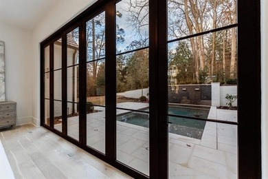 Tucked away on a private corner along a tree-lined cul-de-sac - photo 22