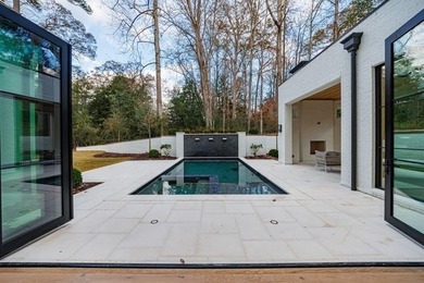 Tucked away on a private corner along a tree-lined cul-de-sac - photo 23