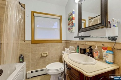 This beautiful raised ranch offers a great location with - photo 11